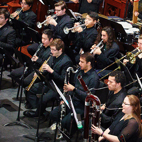 Ensemble of woodwind instrumentalists.