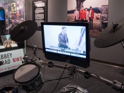 Drum set with a monitor